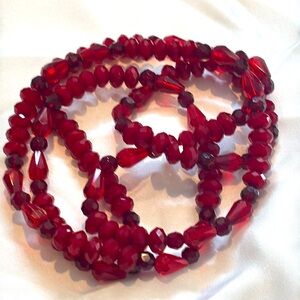 Long dark red beaded necklace